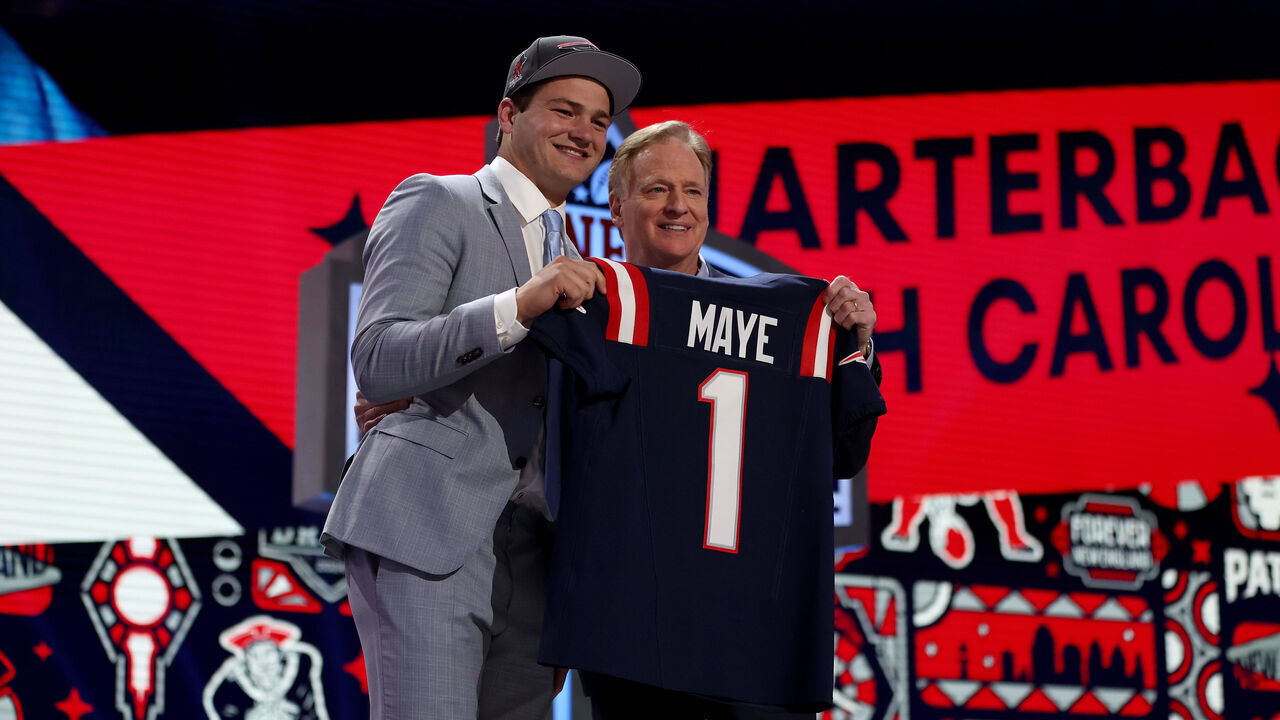 DETROIT, MICHIGAN - APRIL 25: (L-R) Drake Maye poses with NFL Commissioner Roger Goodell after being selected third overall by the New England Patriots during the first round of the 2024 NFL Draft at Campus Martius Park and Hart Plaza on April 25, 2024 in Detroit, Michigan.