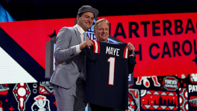 DETROIT, MICHIGAN - APRIL 25: (L-R) Drake Maye poses with NFL Commissioner Roger Goodell after being selected third overall by the New England Patriots during the first round of the 2024 NFL Draft at Campus Martius Park and Hart Plaza on April 25, 2024 in Detroit, Michigan.