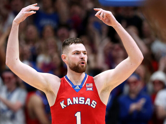 LAWRENCE, KANSAS - MARCH 05: Hunter Dickinson #1 of the Kansas Jayhawks reacts after scoring during the 1st half of the game against the Kansas State Wildcats at Allen Fieldhouse on March 05, 2024 in Lawrence, Kansas.