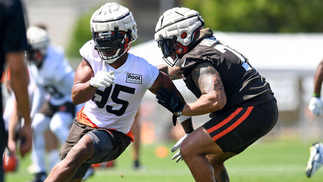 BEREA, OH - JULY 30: Myles Garrett #95 of the Cleveland Browns rushes against Jedrick Wills Jr. #71 during Cleveland Browns training camp at CrossCountry Mortgage Campus on July 30, 2022 in Berea, Ohio.