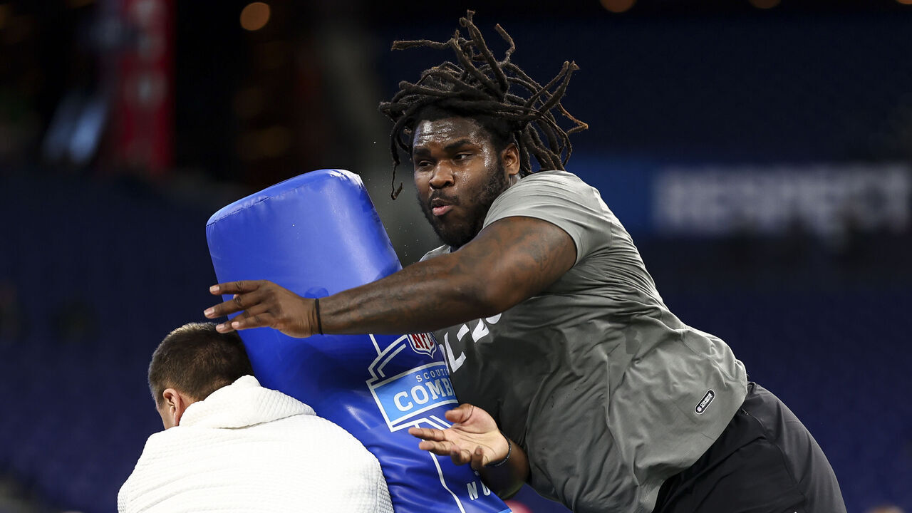 INDIANAPOLIS, INDIANA - FEBRUARY 29: T'Vondre Sweat #DL25 of Texas participates in a drill during the NFL Combine at Lucas Oil Stadium on February 29, 2024 in Indianapolis, Indiana.