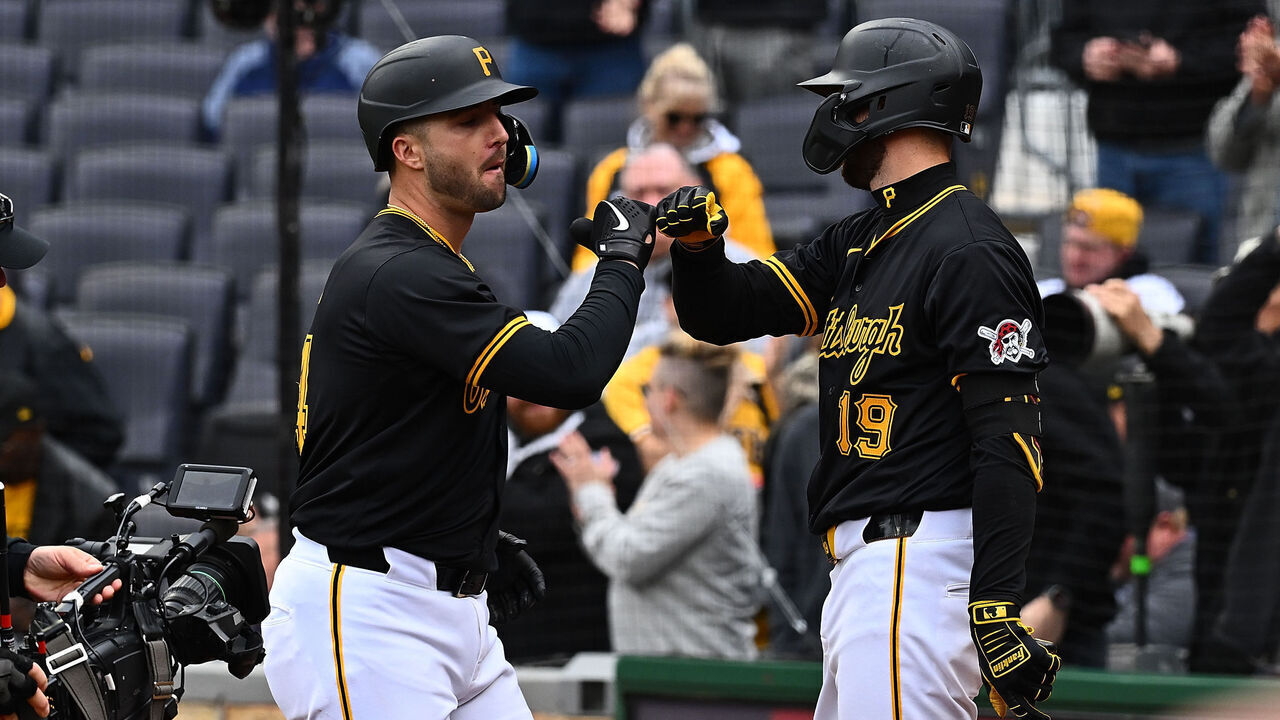 PITTSBURGH, PENNSYLVANIA - APRIL 25: Joey Bart #14 of the Pittsburgh Pirates celebrates with Jared Triolo #19 after hitting a three run home run in the first inning during the game against the Milwaukee Brewers at PNC Park on April 25, 2024 in Pittsburgh, Pennsylvania.