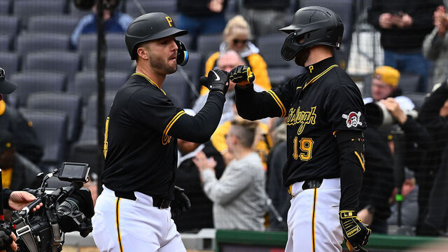 PITTSBURGH, PENNSYLVANIA - APRIL 25: Joey Bart #14 of the Pittsburgh Pirates celebrates with Jared Triolo #19 after hitting a three run home run in the first inning during the game against the Milwaukee Brewers at PNC Park on April 25, 2024 in Pittsburgh, Pennsylvania.
