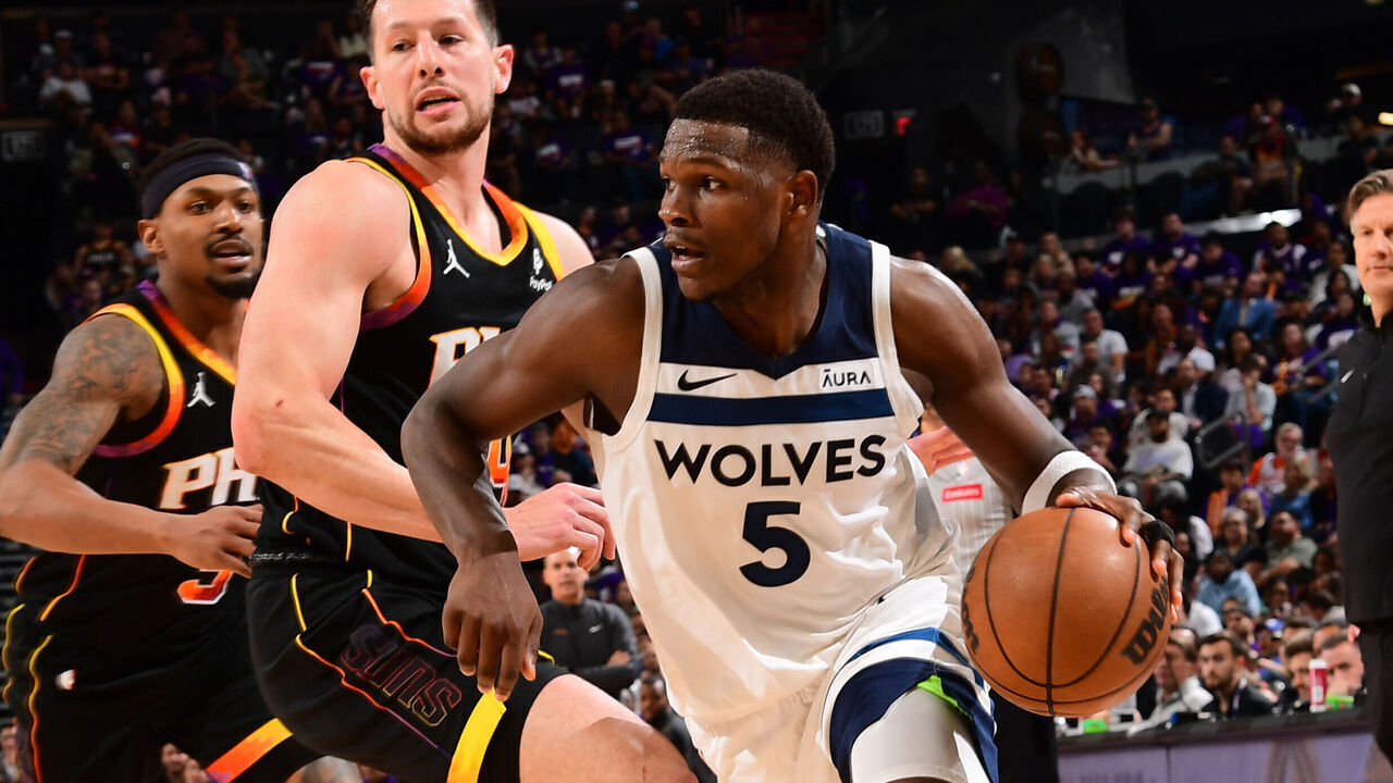 PHOENIX, AZ - APRIL 26: Anthony Edwards #5 of the Minnesota Timberwolves handles the ball during the game against the Phoenix Suns on April 26, 2024 at Footprint Center in Phoenix, Arizona. Mandatory Copyright Notice: Copyright 2024 NBAE