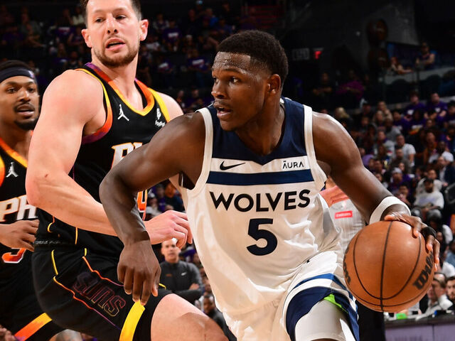 PHOENIX, AZ - APRIL 26: Anthony Edwards #5 of the Minnesota Timberwolves handles the ball during the game against the Phoenix Suns on April 26, 2024 at Footprint Center in Phoenix, Arizona. Mandatory Copyright Notice: Copyright 2024 NBAE