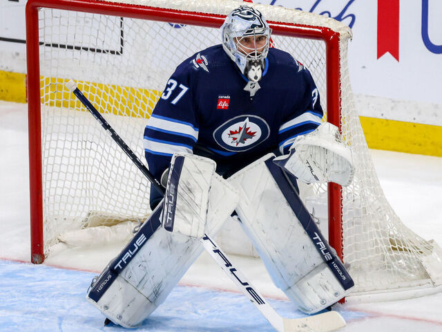 WINNIPEG, CANADA - APRIL 23: Goaltender Connor Hellebuyck #37 of the Winnipeg Jets guards the net during third period action against the Colorado Avalanche in Game Two of the First Round of the 2024 Stanley Cup Playoffs at the Canada Life Centre on April 23, 2024 in Winnipeg, Manitoba, Canada.