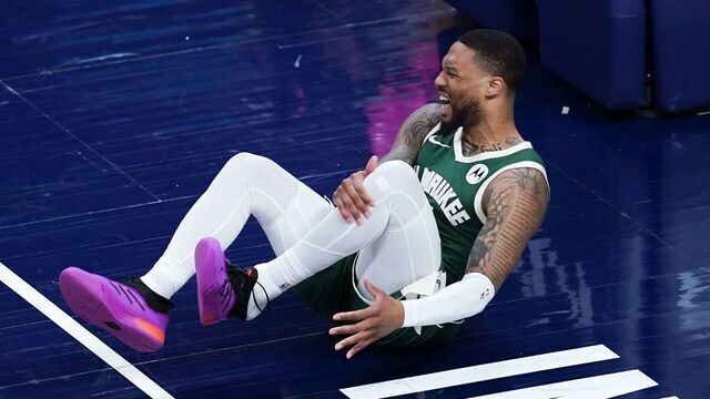 INDIANAPOLIS, INDIANA - APRIL 26: Damian Lillard #0 of the Milwaukee Bucks reacts after being injured in the first quarter against the Indiana Pacers during game three of the Eastern Conference First Round Playoffs at Gainbridge Fieldhouse on April 26, 2024 in Indianapolis, Indiana.