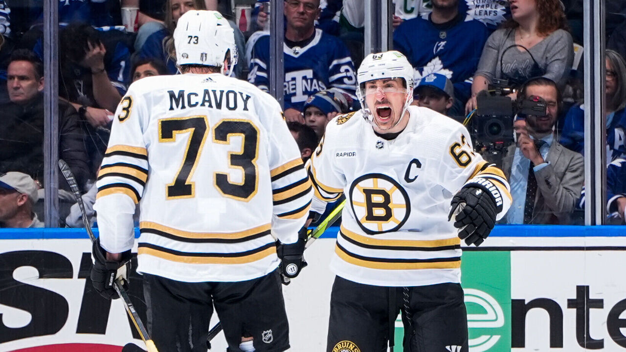 TORONTO, ON - APRIL 27: Brad Marchand #63 of the Boston Bruins celebrates his goal against the Toronto Maple Leafs with teammate Charlie McAvoy #73 during the second period in Game Four of the First Round of the 2024 Stanley Cup Playoffs at Scotiabank Arena on April 27, 2024 in Toronto, Ontario, Canada.