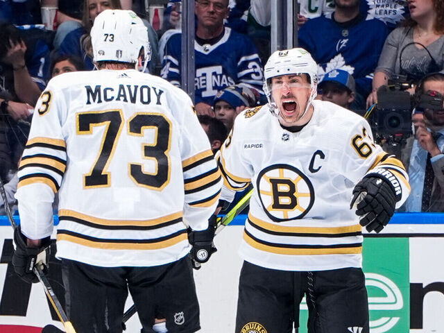 TORONTO, ON - APRIL 27: Brad Marchand #63 of the Boston Bruins celebrates his goal against the Toronto Maple Leafs with teammate Charlie McAvoy #73 during the second period in Game Four of the First Round of the 2024 Stanley Cup Playoffs at Scotiabank Arena on April 27, 2024 in Toronto, Ontario, Canada.