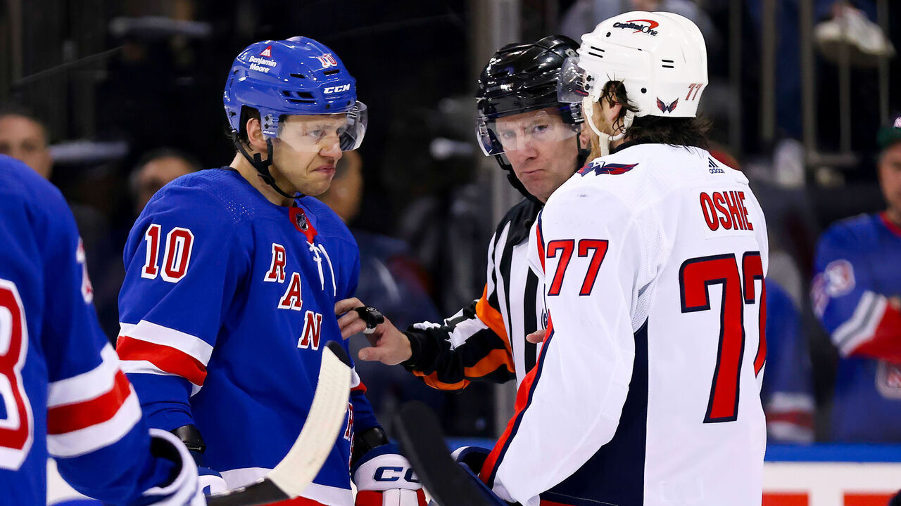 NEW YORK, NY - APRIL 23: New York Rangers Left Wing Artemi Panarin (10) stares down Washington Capitals Right Wing T.J. Oshie (77) during the second period of the National Hockey League Stanley Cup Playoffs Eastern Conference First Round game between the Washington Capitals and the New York Rangers on April 23, 2024 at Madison Square Garden in New York, NY.