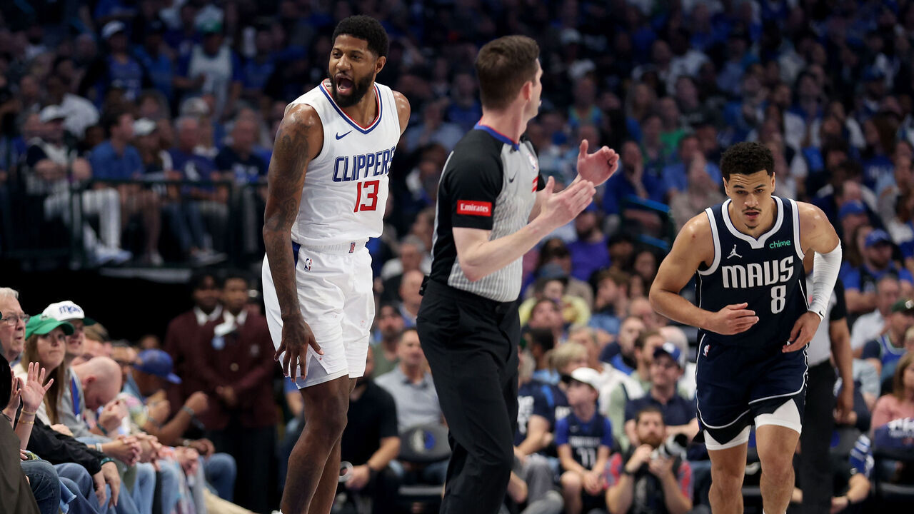 DALLAS, TEXAS - APRIL 28: Paul George #13 of the Los Angeles Clippers celebrates after a three point-basket in the first half against the Dallas Mavericks during game four of the Western Conference First Round Playoffs at American Airlines Center on April 28, 2024 in Dallas, Texas.