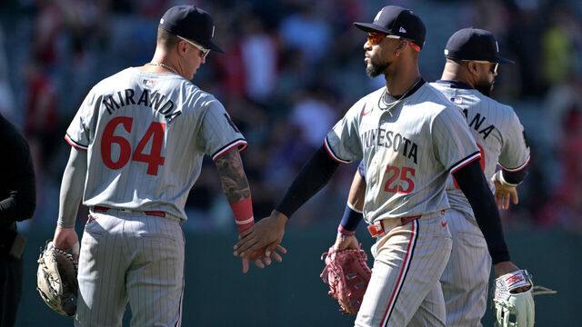 ANAHEIM, CALIFORNIA - APRIL 28: Jose Miranda #64 and Byron Buxton #25 of the Minnesota Twins celebrate after the final out of the ninth inning defeating the Los Angeles Angels at Angel Stadium of Anaheim on April 28, 2024 in Anaheim, California.
