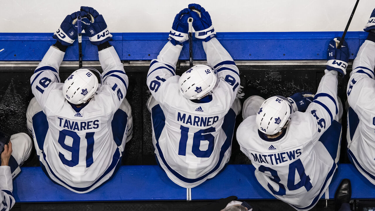 TAMPA, FL - APRIL 17: John Tavares #91, Mitch Marner #16, Auston Matthews #34 and Noah Gregor #18 of the Toronto Maple Leafs watch the play on the ice against the Tampa Bay Lightning at Amalie Arena on April 17, 2024 in Tampa, Florida.