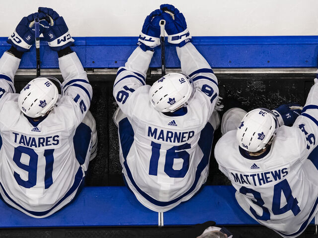 TAMPA, FL - APRIL 17: John Tavares #91, Mitch Marner #16, Auston Matthews #34 and Noah Gregor #18 of the Toronto Maple Leafs watch the play on the ice against the Tampa Bay Lightning at Amalie Arena on April 17, 2024 in Tampa, Florida.