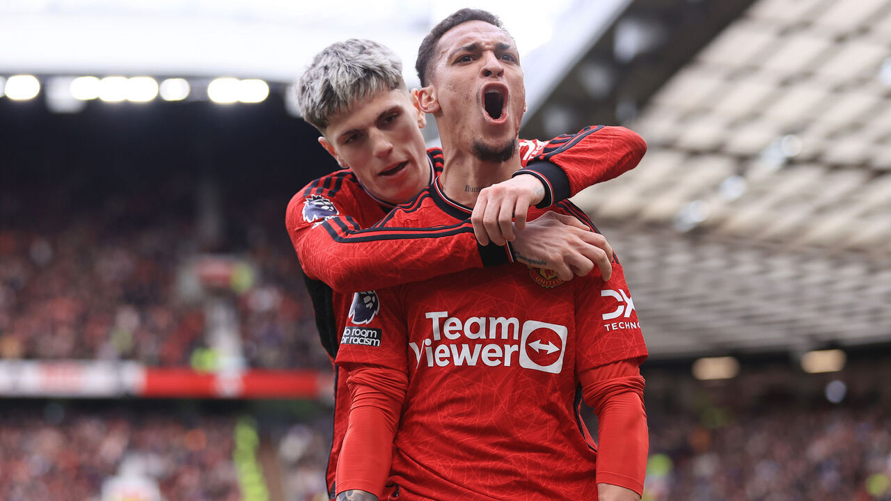 MANCHESTER, ENGLAND - APRIL 27: Antony of Manchester United (R) celebrates with Alejandro Garnacho of Manchester United after scoring their 1st goal during the Premier League match between Manchester United and Burnley FC at Old Trafford on April 27, 2024 in Manchester, England.