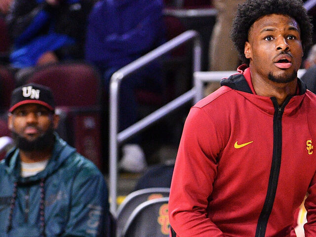 LOS ANGELES, CA - JANUARY 10: Lebron and Savannah James watch their son USC Trojans guard Bronny James (6) warm up before the college basketball game between the Washington State Cougars and the USC Trojans on January 10, 2024 at Galen Center in Los Angeles, CA.