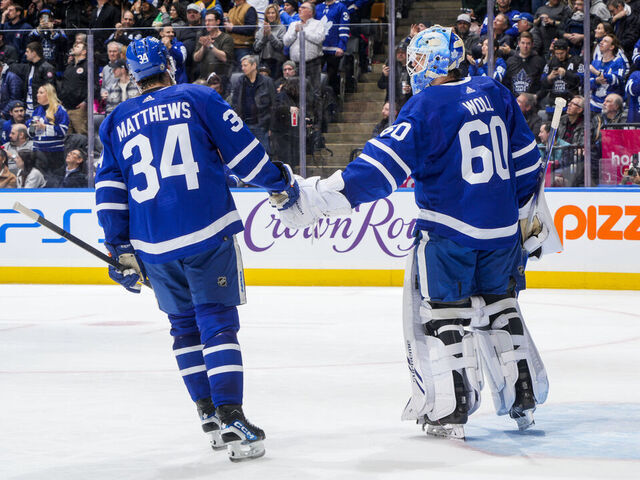 TORONTO, ON - FEBRUARY 29: Auston Matthews #34 of the Toronto Maple Leafs celebrates his goal against the Arizona Coyotes with teammate Joseph Woll #60 during the second period at Scotiabank Arena on February 29, 2024 in Toronto, Ontario, Canada.