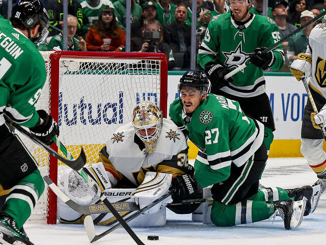 DALLAS, TX - APRIL 24: Dallas Stars left wing Mason Marchment (27) crashes into Vegas Golden Knights goaltender Logan Thompson (36) chasing the puck during game two of the Western Conference First Round between the Dallas Stars and the Vegas Golden Knights on April 24, 2024 at American Airlines Center in Dallas, Texas.
