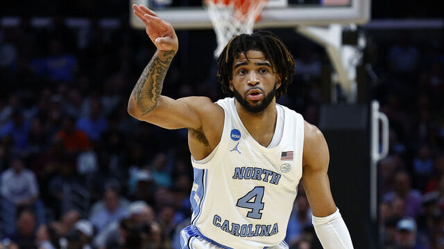 LOS ANGELES, CALIFORNIA - MARCH 28: RJ Davis #4 of the North Carolina Tar Heels dribbles against the Alabama Crimson Tide during the first half in the Sweet 16 round of the NCAA Men's Basketball Tournament at Crypto.com Arena on March 28, 2024 in Los Angeles, California.