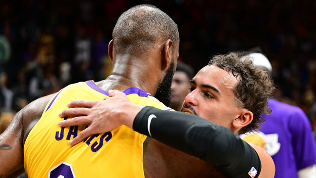 ATLANTA, GA - DECEMBER 30: LeBron James #6 of the Los Angeles Lakers embraces Trae Young #11 of the Atlanta Hawks after the game against the Atlanta Hawks on December 1, 2022 at State Farm Arena in Atlanta, Georgia. NOTE TO USER: User expressly acknowledges and agrees that, by downloading and/or using this Photograph, user is consenting to the terms and conditions of the Getty Images License Agreement. Mandatory Copyright Notice: Copyright 2022 NBAE