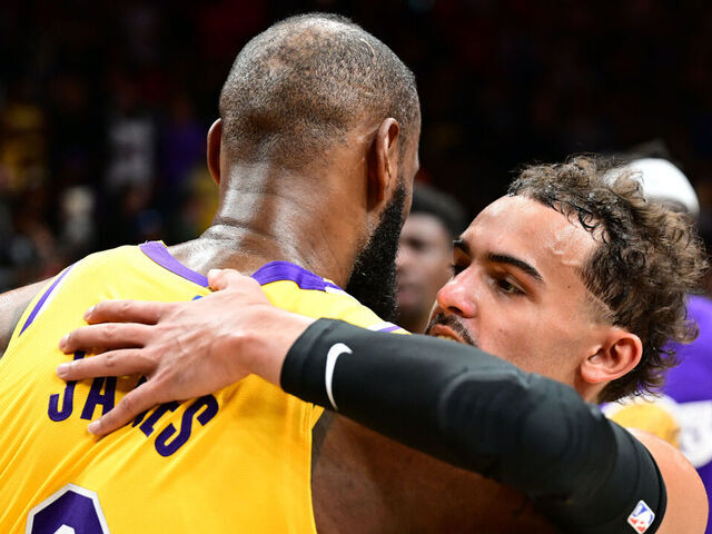 ATLANTA, GA - DECEMBER 30: LeBron James #6 of the Los Angeles Lakers embraces Trae Young #11 of the Atlanta Hawks after the game against the Atlanta Hawks on December 1, 2022 at State Farm Arena in Atlanta, Georgia. NOTE TO USER: User expressly acknowledges and agrees that, by downloading and/or using this Photograph, user is consenting to the terms and conditions of the Getty Images License Agreement. Mandatory Copyright Notice: Copyright 2022 NBAE