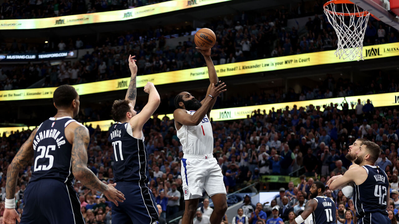 DALLAS, TEXAS - APRIL 28: James Harden #1 of the Los Angeles Clippers goes up for a shot while defended by Luka Doncic #77 of the Dallas Mavericks in the second half of game four of the Western Conference First Round Playoffs at American Airlines Center on April 28, 2024 in Dallas, Texas.