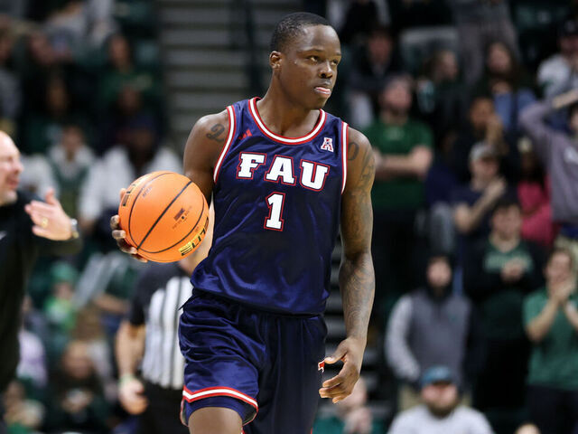 CHARLOTTE, NORTH CAROLINA - JANUARY 6: Johnell Davis #1 of the Florida Atlantic Owls moves the ball against the Charlotte 49ers at Dale F. Halton Arena on January 6, 2024 in Charlotte, North Carolina.