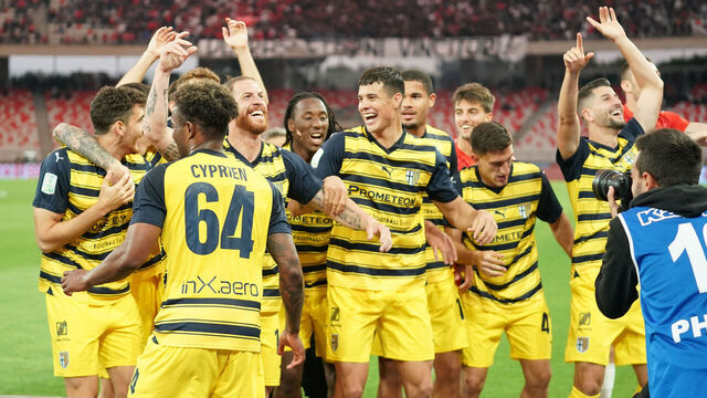 The Parma Calcio players are celebrating their mathematical promotion to Serie A at the end of the Serie B match on the SSC Bari field in Bari, Italy, on May 1, 2024.