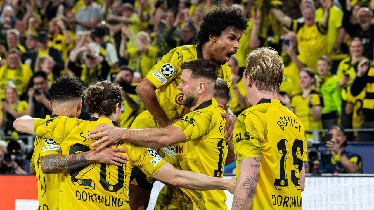 DORTMUND, GERMANY - MAY 01: Niclas Fuellkrug of Borussia Dortmund celebrates with teammates after scoring his team's first goal during the UEFA Champions League semi-final first leg match between Borussia Dortmund and Paris Saint-Germain at Signal Iduna Park on May 01, 2024 in Dortmund, Germany.