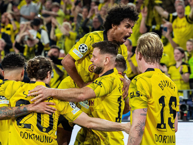 DORTMUND, GERMANY - MAY 01: Niclas Fuellkrug of Borussia Dortmund celebrates with teammates after scoring his team's first goal during the UEFA Champions League semi-final first leg match between Borussia Dortmund and Paris Saint-Germain at Signal Iduna Park on May 01, 2024 in Dortmund, Germany.