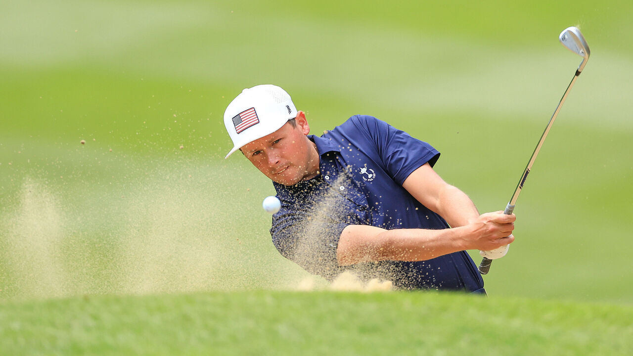 OTTERSHAW, ENGLAND - SEPTEMBER 18: Ben Polland of the United States team plays a shot during the singles matches on Day Three of the 2022 PGA Cup on The Longcross Course at Foxhills Club and Resort on September 18, 2022 in Ottershaw, England.