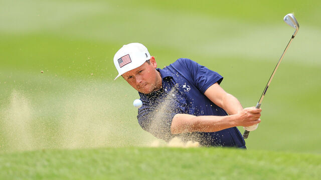 OTTERSHAW, ENGLAND - SEPTEMBER 18: Ben Polland of the United States team plays a shot during the singles matches on Day Three of the 2022 PGA Cup on The Longcross Course at Foxhills Club and Resort on September 18, 2022 in Ottershaw, England.