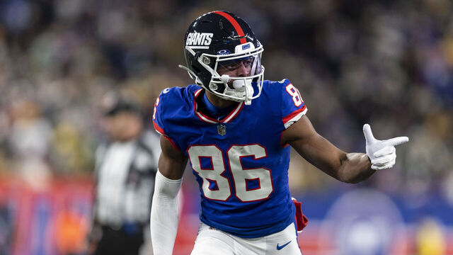 EAST RUTHERFORD, NEW JERSEY - DECEMBER 11: Darius Slayton #86 of the New York Giants signals as he lines up during an NFL football game between the New York Giants and the Green Bay Packers at MetLife Stadium on December 11, 2023 in East Rutherford, New Jersey.