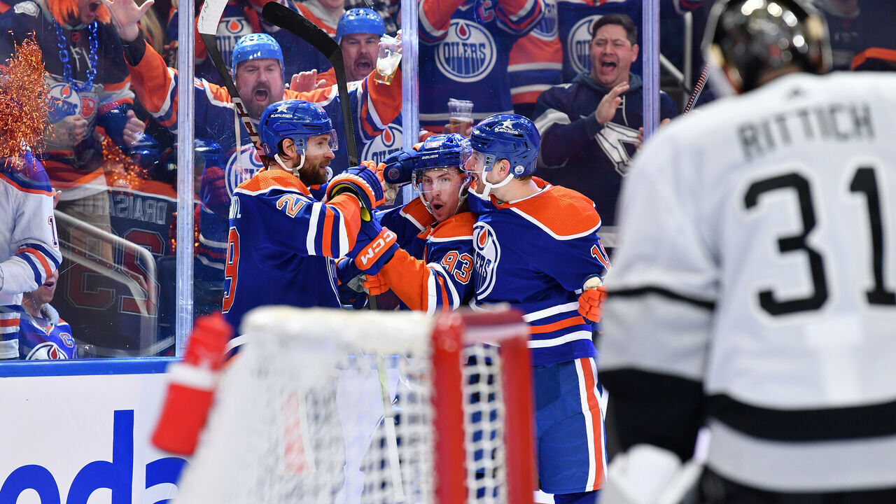 EDMONTON, CANADA - MAY 01: Leon Draisaitl #29 of the Edmonton Oilers celebrates his second goal of the game in the second period against the Los Angeles Kings with teammates Zach Hyman #18 and Ryan Nugent-Hopkins #93 in Game Five of the First Round of the 2024 Stanley Cup Playoffs at Rogers Place on May 1, 2024, in Edmonton, Alberta, Canada.