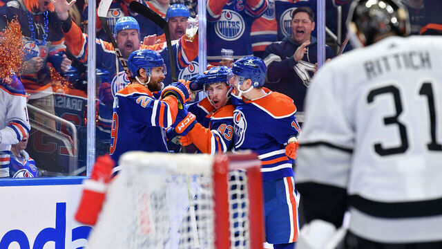 EDMONTON, CANADA - MAY 01: Leon Draisaitl #29 of the Edmonton Oilers celebrates his second goal of the game in the second period against the Los Angeles Kings with teammates Zach Hyman #18 and Ryan Nugent-Hopkins #93 in Game Five of the First Round of the 2024 Stanley Cup Playoffs at Rogers Place on May 1, 2024, in Edmonton, Alberta, Canada.