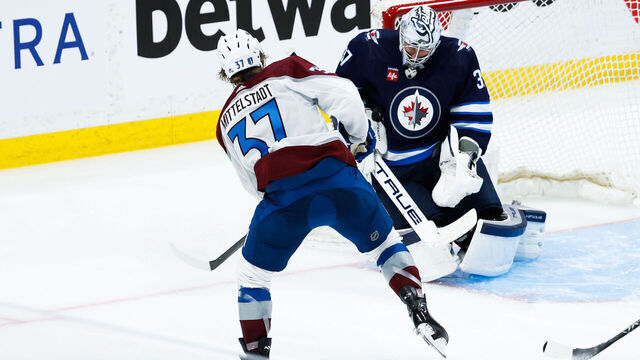 WINNIPEG, MB - APRIL 21: Winnipeg Jets goalie Connor Hellebuyck (37) makes a save on a shot by Colorado Avalanche forward Carey Mittelstadt (37) during the Western Conference First Round game between the Winnipeg Jets and the Colorado Avalanche on April 21, 2024 at the Canada Life Centre in Winnipeg MB. by Terrence Lee/Icon Sportswire via Getty Images)