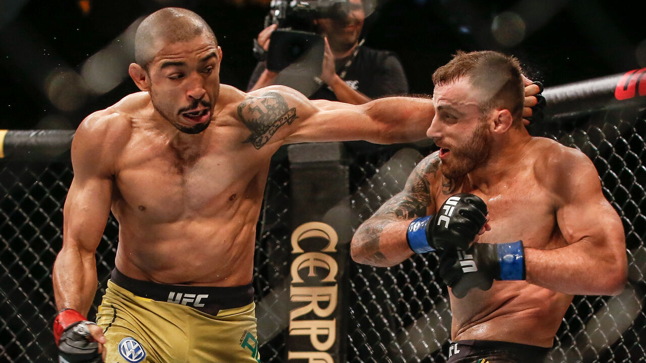 RIO DE JANEIRO, BRAZIL - MAY 11: (L-R) Jose Aldo of Brazil punches Alexander Volkanovski of Australia in their Featherweight bout during the UFC 237event at Jeunesse Arena on May 11, 2019 in Rio de Janeiro, Brazil.