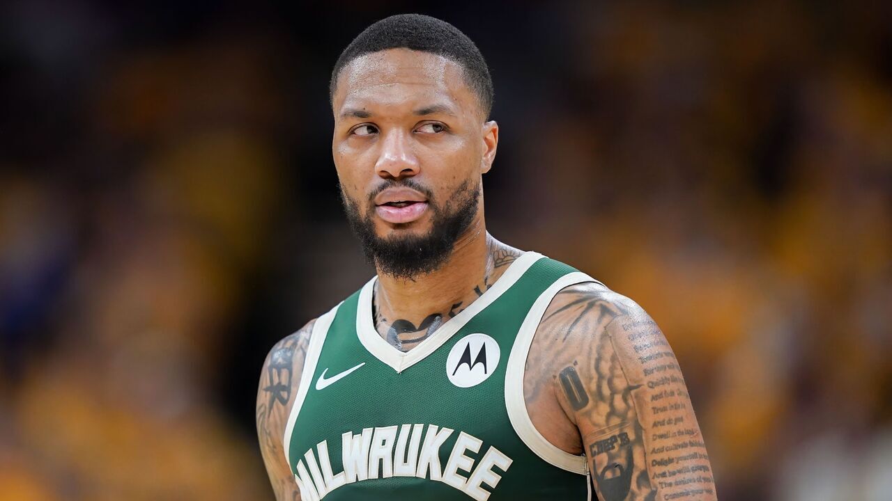 INDIANAPOLIS, INDIANA - APRIL 26: Damian Lillard #0 of the Milwaukee Bucks walks across the court in the fourth quarter during game three of the Eastern Conference First Round Playoffs at Gainbridge Fieldhouse on April 26, 2024 in Indianapolis, Indiana.