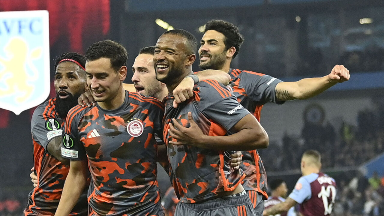 Olympiakos' Moroccan striker #09 Ayoub el-Kaabi (2R) celebrates with teammates after scoring his third goal from the penalty spot during the UEFA Europa Conference League semi final first leg football match between Aston Villa and Olympiakos at Villa Park in Birmingham, central England, on May 2, 2024.