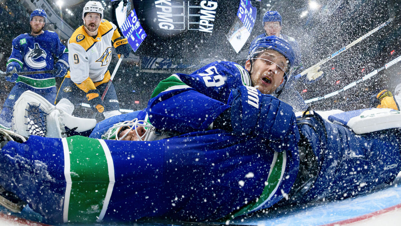 VANCOUVER, CANADA - APRIL 30: Filip Forsberg #9 of the Nashville Predators Arturs Silovs #31 Teddy Blueger #53 Nikita Zadorov #91 and Elias Lindholm #23 of the Vancouver Canucks look on after a goal by Roman Josi #59 of the Nashville Predators during the third period in Game Five of the First Round of the 2024 Stanley Cup Playoffs at Rogers Arena on April 30, 2024 in Vancouver, British Columbia, Canada.