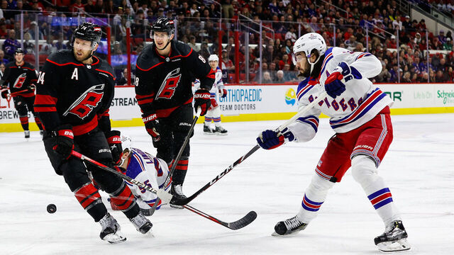 RALEIGH, NC - MARCH 12: Mika Zibanejad #93 of the New York Rangers shoots the puck during the first period of the game against the Carolina Hurricanes at PNC Arena on March 12, 2024 in Raleigh, North Carolina. Rangers defeat Hurricanes 1-0.