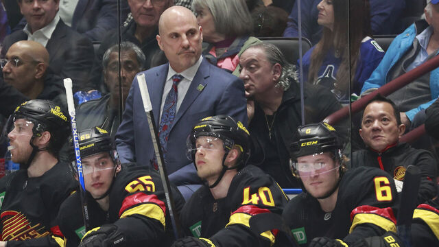 VANCOUVER, CANADA - APRIL 10: Head coach Rick Tocchet of the Vancouver Canucks looks on from the bench during their NHL game against the Arizona Coyotes at Rogers Arena on April 10, 2024 in Vancouver, British Columbia, Canada.