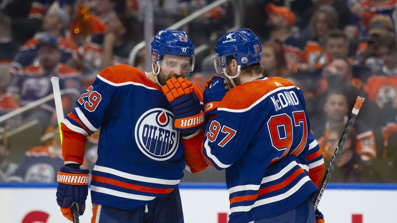EDMONTON, CANADA - APRIL 22: Leon Draisaitl #29 and Connor McDavid #97 of the Edmonton Oilers strategize against the Los Angeles Kings during the second period in Game One of the First Round of the 2024 Stanley Cup Playoffs at Rogers Place on April 22, 2024, in Edmonton, Canada.