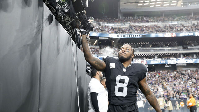 LAS VEGAS, NEVADA - DECEMBER 10: Josh Jacobs #8 of the Las Vegas Raiders greets fans before the game against the Minnesota Vikings at Allegiant Stadium on December 10, 2023 in Las Vegas, Nevada.