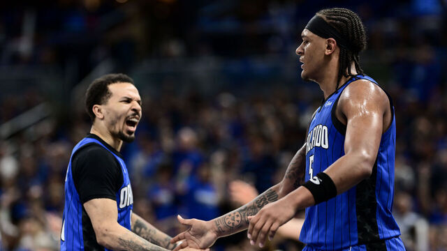 ORLANDO, FLORIDA - MAY 03: Paolo Banchero #5 of the Orlando Magic celebrates with Cole Anthony #50 of the Orlando Magic against the Cleveland Cavaliers during the first quarter in Game Six of the Eastern Conference First Round Playoffs at Kia Center on May 03, 2024 in Orlando, Florida.