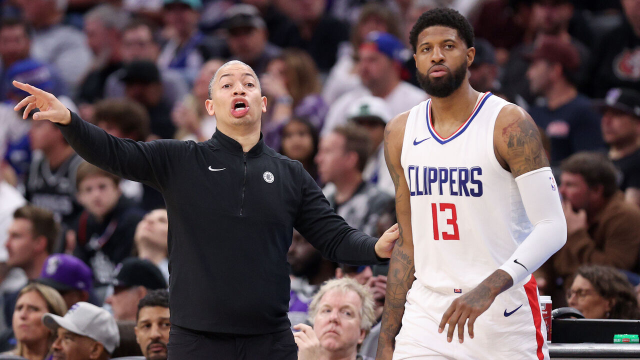 SACRAMENTO, CALIFORNIA - APRIL 02: LA Clippers head coach Tyronn Lue shouts to his team while standing next to Paul George #13 during their game against the Sacramento Kings in the first half at Golden 1 Center on April 02, 2024 in Sacramento, California.