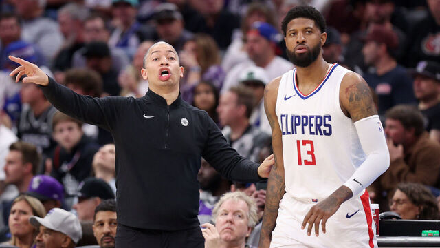 SACRAMENTO, CALIFORNIA - APRIL 02: LA Clippers head coach Tyronn Lue shouts to his team while standing next to Paul George #13 during their game against the Sacramento Kings in the first half at Golden 1 Center on April 02, 2024 in Sacramento, California.