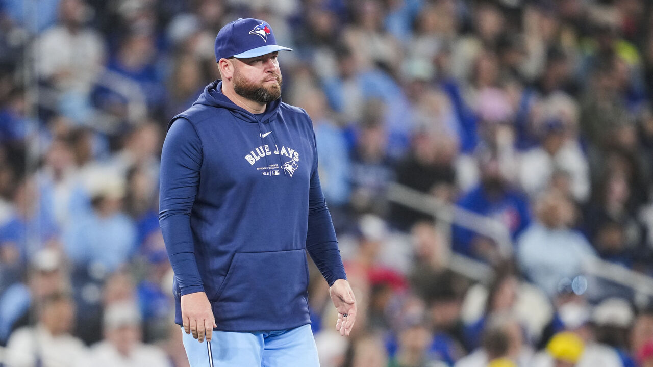 TORONTO, ON - APRIL 28: John Schneider manager of Toronto Blue Jays walks to the mound in a break in play against the Los Angeles Dodgers in their MLB game at the Rogers Centre on April 28, 2024 in Toronto, Ontario, Canada.
