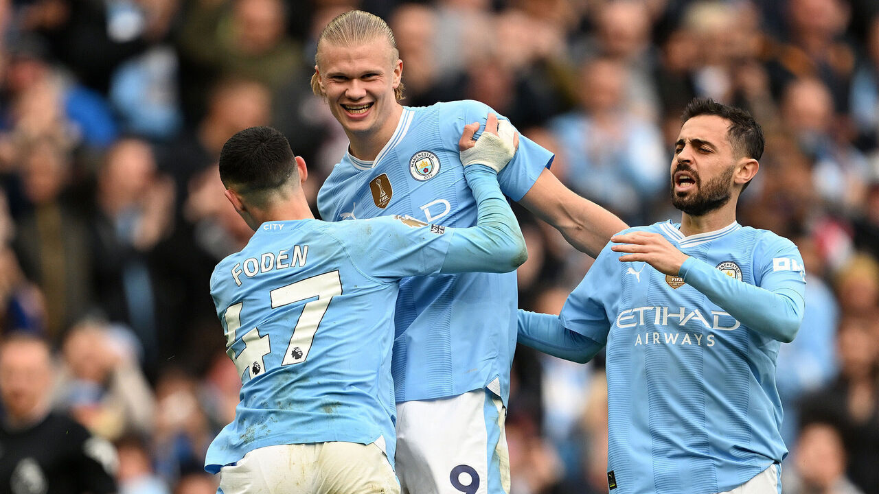 MANCHESTER, ENGLAND - MAY 04: Erling Haaland of Manchester City celebrates scoring his team's fourth goal with teammates Phil Foden and Bernardo Silva during the Premier League match between Manchester City and Wolverhampton Wanderers at Etihad Stadium on May 04, 2024 in Manchester, England.