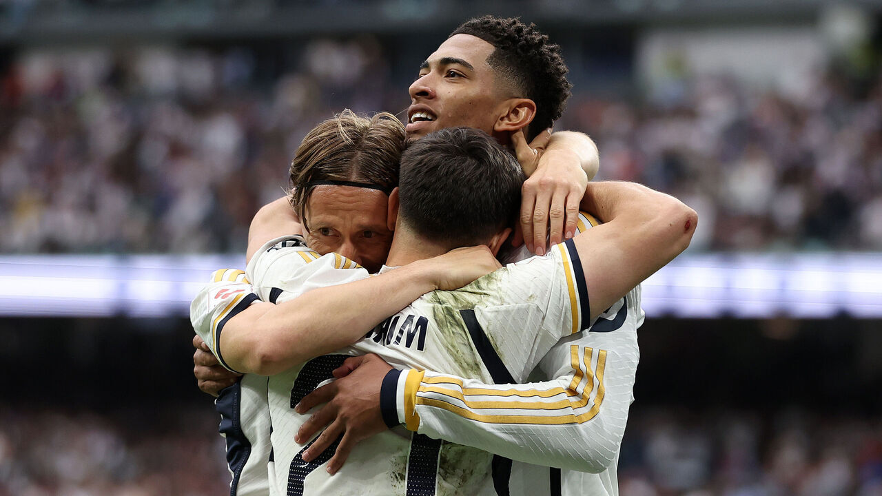 MADRID, SPAIN - MAY 04: Jude Bellingham of Real Madrid celebrates scoring his team's second goal with teammates Brahim Diaz and Luka Modric during the LaLiga EA Sports match between Real Madrid CF and Cadiz CF at Santiago Bernabéu Stadium on May 04, 2024 in Madrid, Spain.